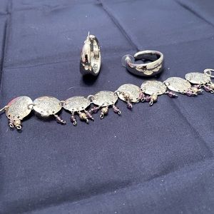 Hand made bracelet tooled silver circles with small dangling beads.